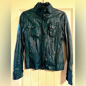 Guess Motorcycle teal jacket.
Size Medium